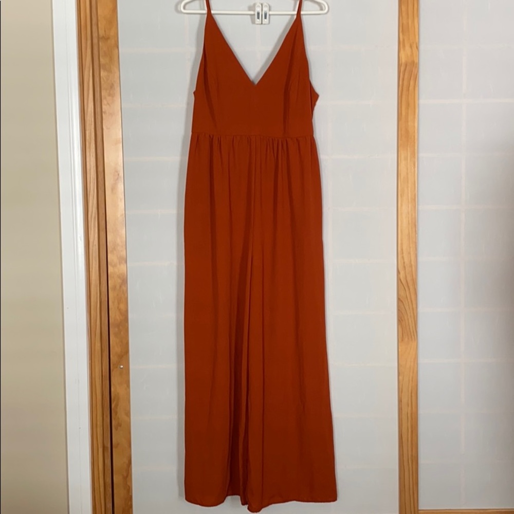 Rust wide leg jumpsuit with pockets